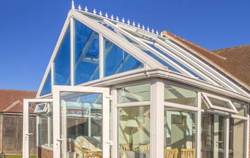 conservatory roof insulation costs Carew Newton